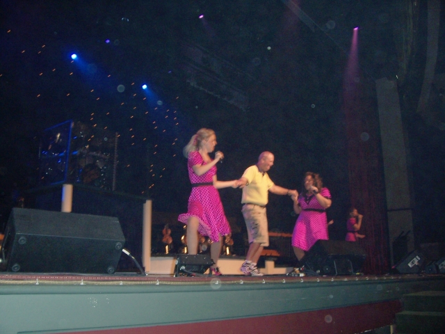 Bob Deane onstage in Branson, showing his stuff with the Lowe Sisters.  Yep, he was set up, but he had a good time as you can tell! Taken the Monday after the reunion.  Come and visit us, and we will do all we can to embrass you too!!  Dale & Cindy Hedric