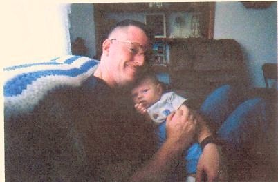 Bay B Booth Jr (got home from Afghanistan in Nov. 2002  holding Brandon born in February